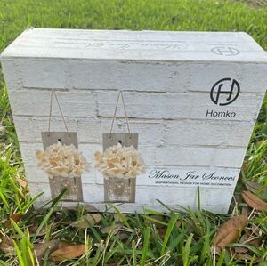 Mason Jar Sconces with floral and fairy lights. New